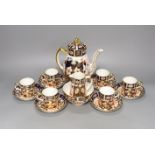 A Royal Crown Derby Imari pattern 2451 coffee set, comprising coffee pot, bowl jug and six cups
