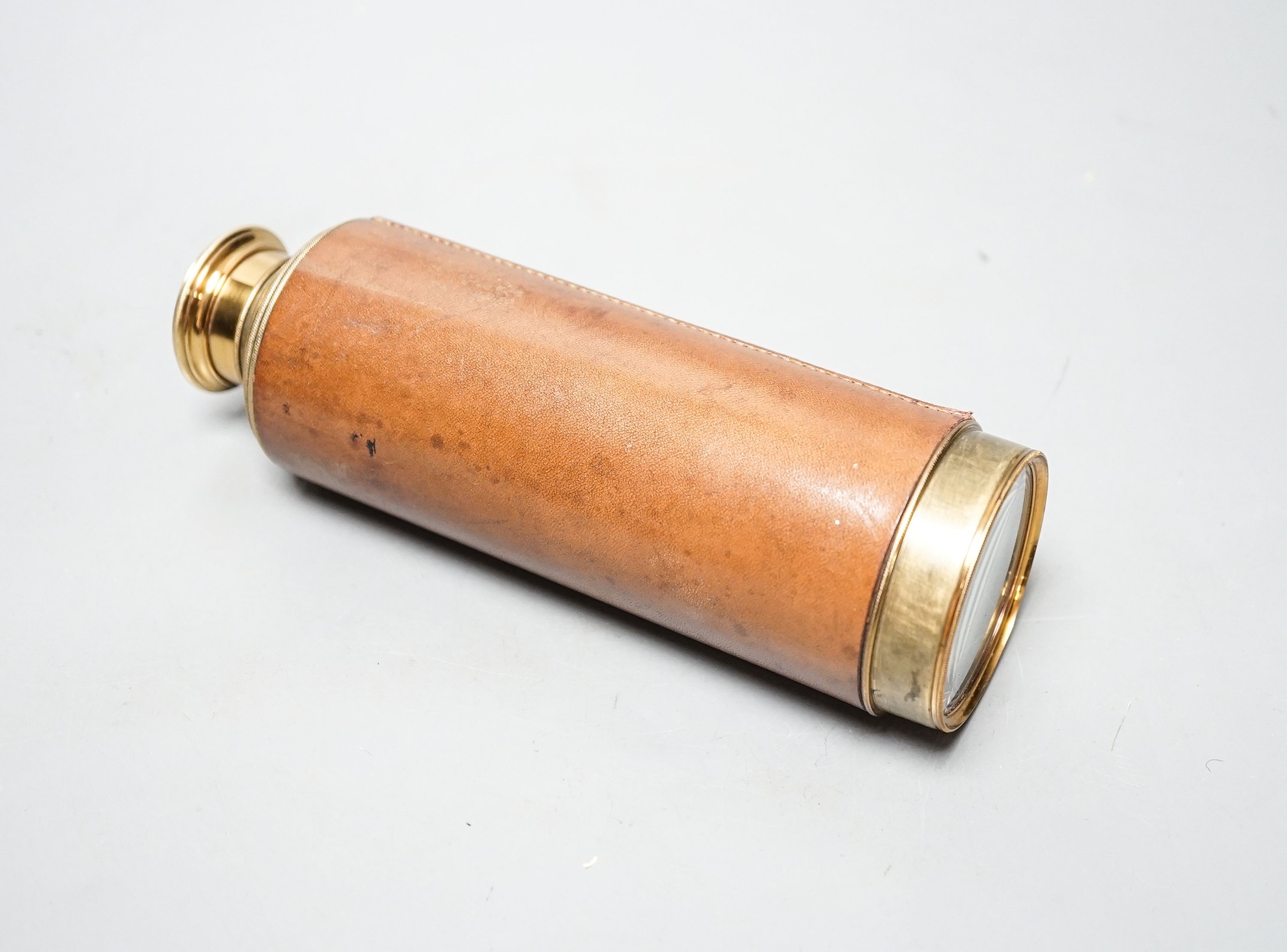 A Dolland Day or Night brass and leather nine draw telescope with case. Inscribed ‘Jas. Hy.