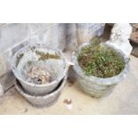 A pair of reconstituted stone basket weave garden planters, diameter 45cm and another planter,