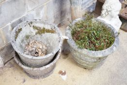 A pair of reconstituted stone basket weave garden planters, diameter 45cm and another planter,