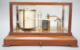 An early 20th century barograph in a mahogany case, 36 cms wide x 21cm high.