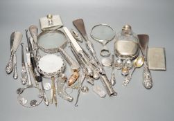 A mixed group of mainly small silver to include two magnifying glasses, a hip flask, silver-