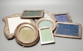 A mixed group of eight various small silver mounted photograph frames, largest 29cm and dated for