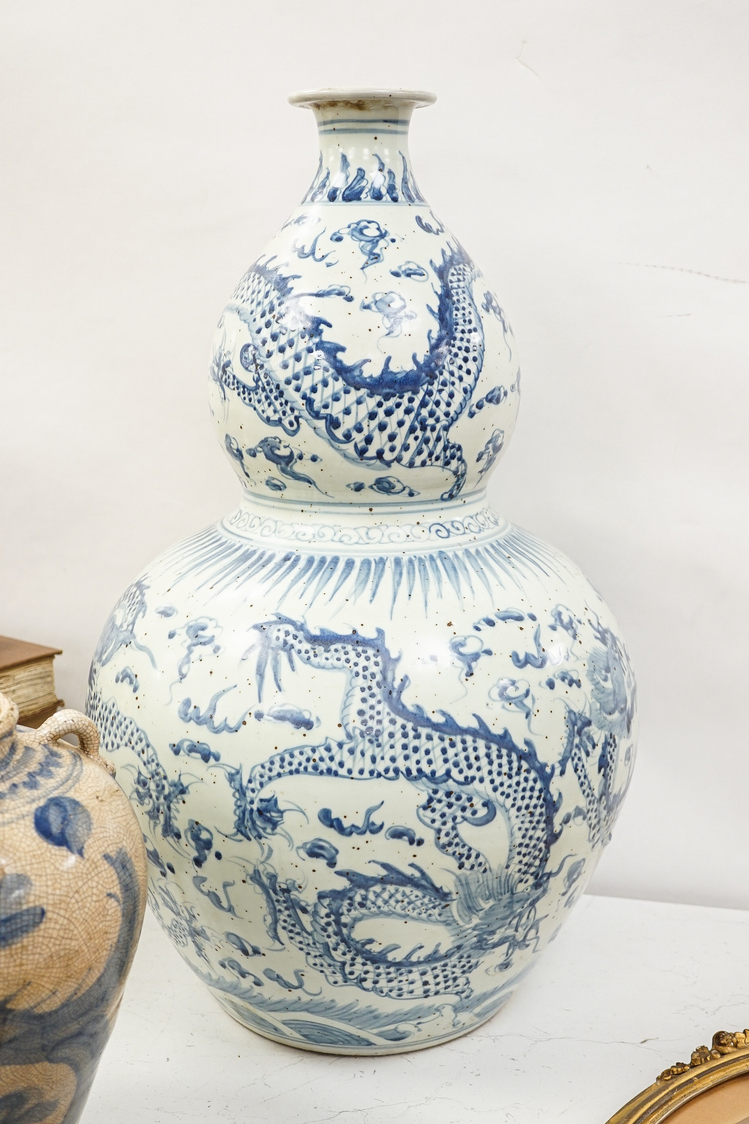 A large Chinese blue and white 'dragon' double gourd vase, 64cm high and an Annamesse style blue and - Image 7 of 13