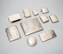 A group of assorted small silver to include four vesta cases, two cigarette cases, a card case, pill