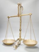 A Doyle & Son, London brass balance scale, 55cm. high