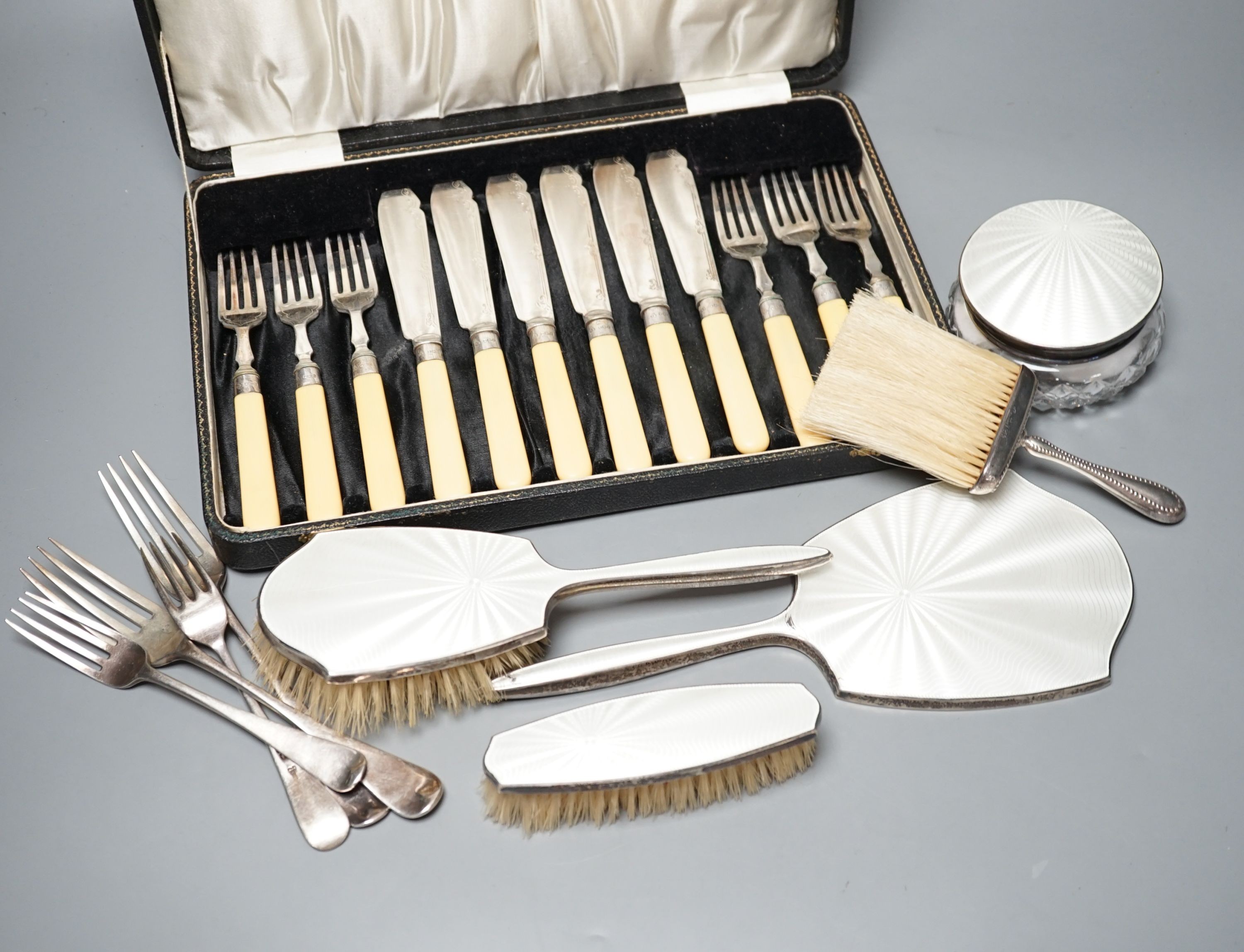 A mixed collection of sundry English silver to include unboxed flatware, a cased set silver