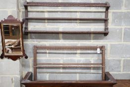 Two Continental carved beech plate racks, length 120cm, height 105cm
