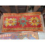 Two antique Oushak Turkish rugs, 77 x 40cm and 72 x 36cm