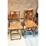 A pair of mahogany hall chairs, (one cut down)