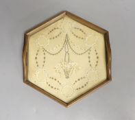 An early Victorian hexagonal tray with ribbon worked embroidery on silk 25cm