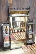 A late Victorian Aesthetic Movement parcel gilt ebonised overmantel mirror, width 134cm, height