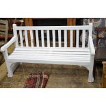 A white painted hardwood garden bench, length 155cm