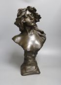 A bronzed resin bust of a lady 47cm