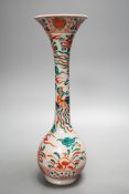 A Chinese Swatow style bottle vase, painted in green and iron red enamels with phoenixes amid