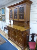 An early 20th century Continental oak buffet, length 147cm, depth 64cm, height 222cm