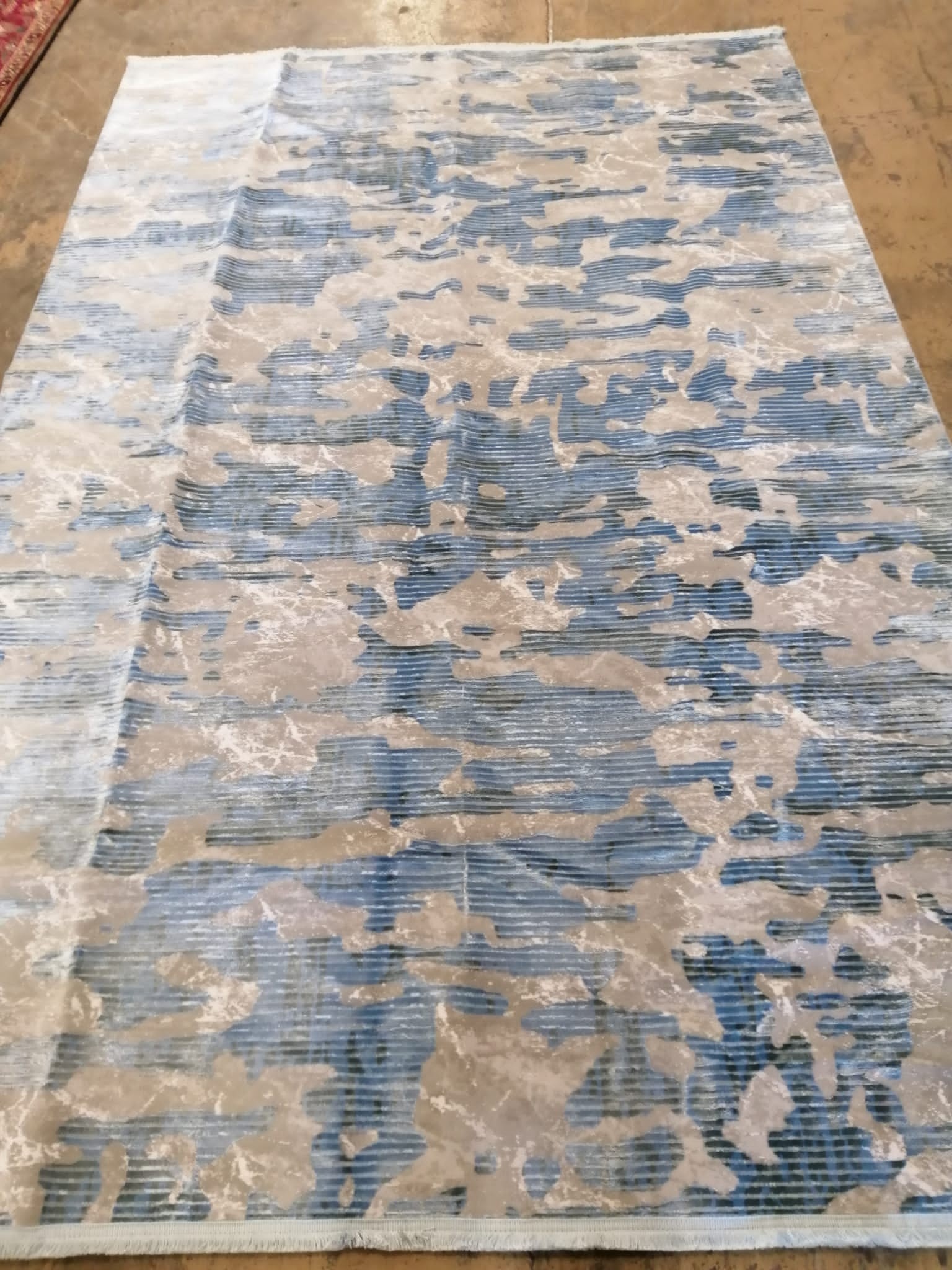 A contemporary bamboo silk rug, 300cm x 200cm
