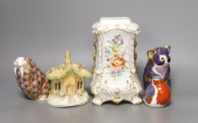 Three Crown Derby animal paperweights, a pastel burner cottage and a Continental gilt and floral