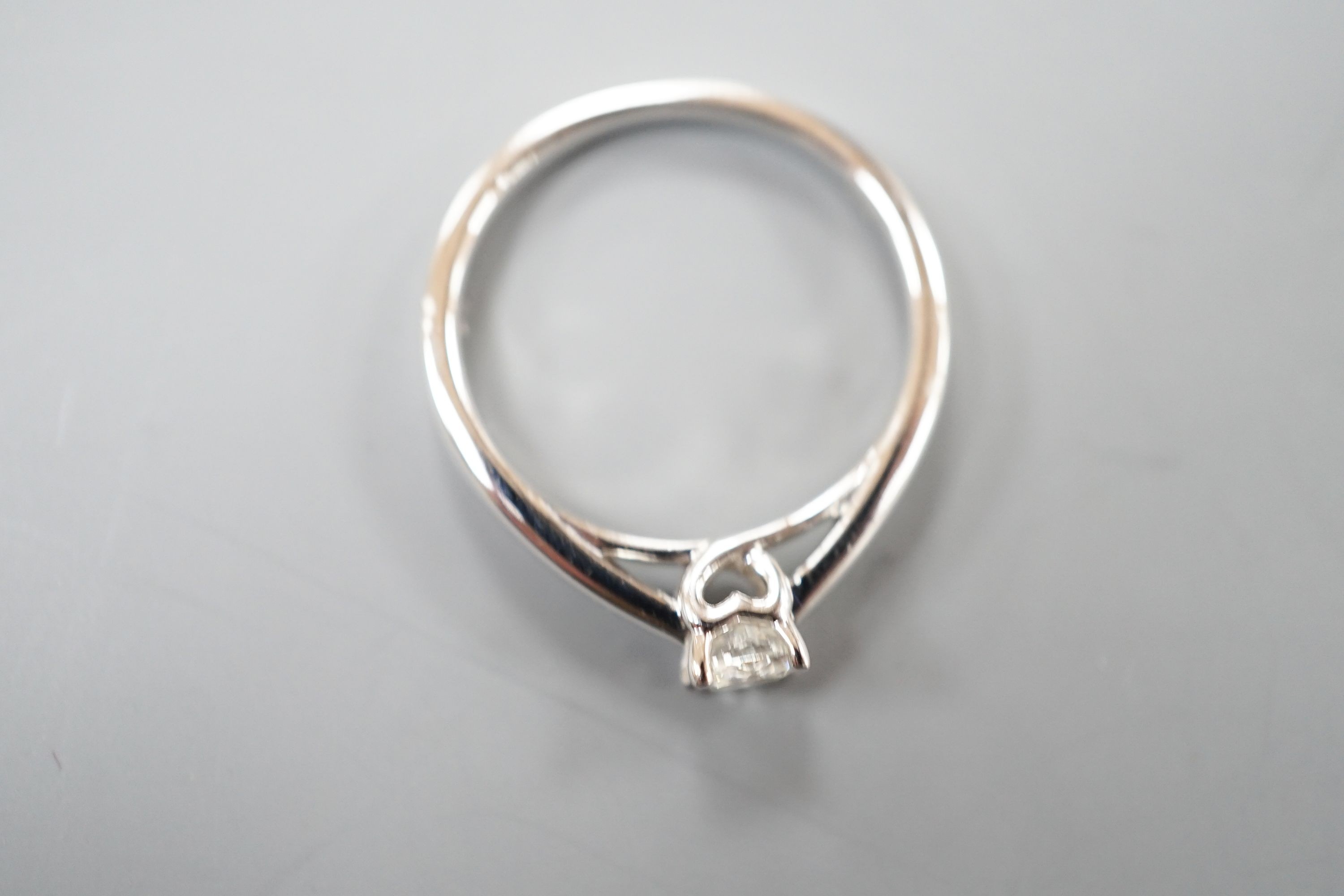 A modern 9k white metal and solitaire diamond ring, the stone weighing 0.33ct, size L, gross - Image 3 of 4