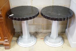 A pair of Art Deco ebonised and silvered wood occasional tables, diameter 60cm, height 71cm