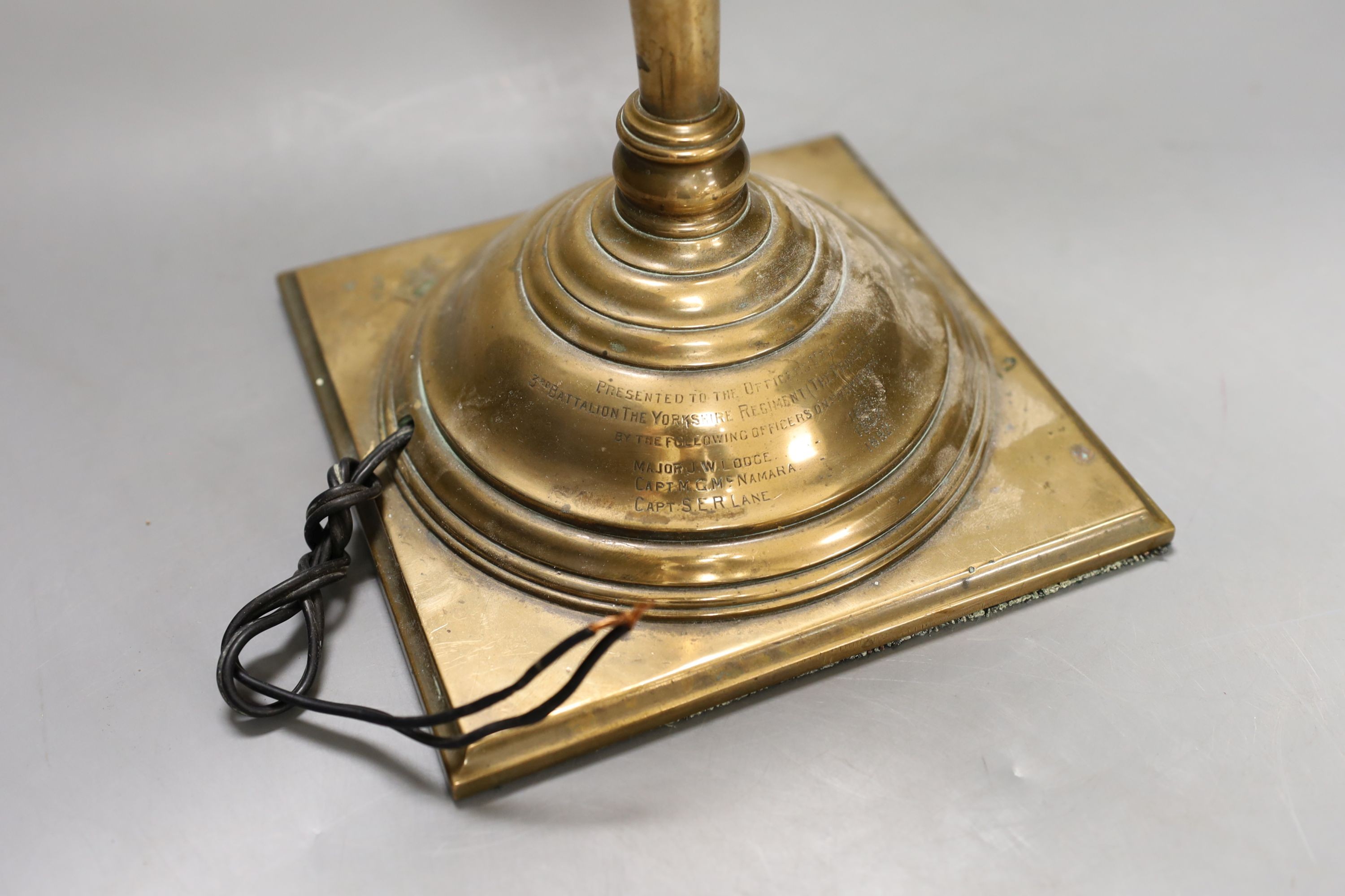 A late Victorian copper alloy table lamp, engraved inscription ‘presented to the officers mess of - Image 2 of 2