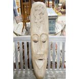 A Polynesian style carved wood mask, height 110cm