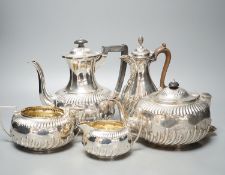 A late Victorian repousse silver four piece tea set, Martin, Hall & Co, Sheffield, 1892, (a.f.)