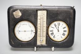 A leather cased pocket watch and barometer with central thermometer, 19.5 cm wide x 13 cms high.