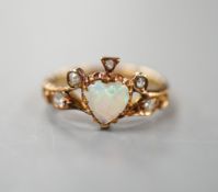 A late Victorian 18ct gold, heart shaped white opal and five stone diamond chip set dress ring, size