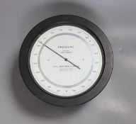 A U.S. Weather Bureau barometer , millibars 990-800, serial number 2052, 21 cms diameter.