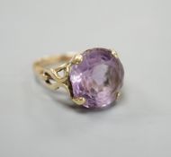 A modern 9ct gold and amethyst set dress ring, size O, gross weight 7.3 grams.