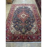 A Tabriz blue ground carpet, 290 x 200cm