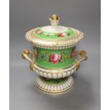 An English porcelain campana shaped ice pail and two covers painted with flowers and a green ground,