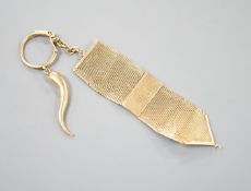 An Italian 750 yellow metal mesh link fob, hung with a yellow metal horn of plenty charm, gross 21.5