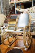 A bamboo bentwood rocking chair