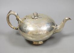 A Victorian engraved silver teapot by William Robert Smily, London, 1952,gross 20.5oz.