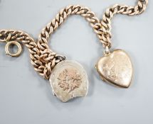 An Edwardian 9ct gold curb link chain, 44cm, hung with a yellow metal locket (gross 36 grams) and