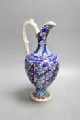 A Turkish Iznik style earthenware ewer, 20th century, 31. 5 cm high