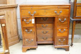 A George III mahogany kneehole desk with slide and four recess drawers, width 80cm, height 79cm