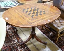 A George III style oval parquetry inlaid games table, width 106cm, depth 79cm, height 73cm