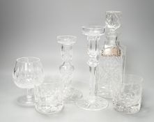 Assorted glassware including six decanters, each with a modern silver wine label