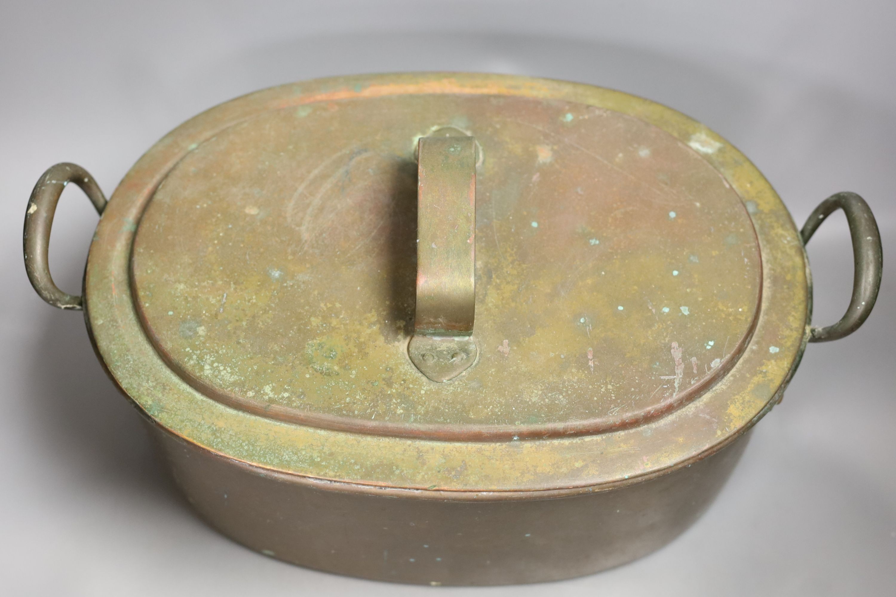 A Victorian oval copper two handled preserve pan and cover.35cms wide. - Image 2 of 2