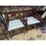 A pair of Regency style brass inlaid mahogany elbow chairs, width 48cm, depth 48cm, height 88cm