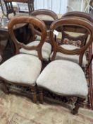 A set of six Victorian balloon back dining chairs