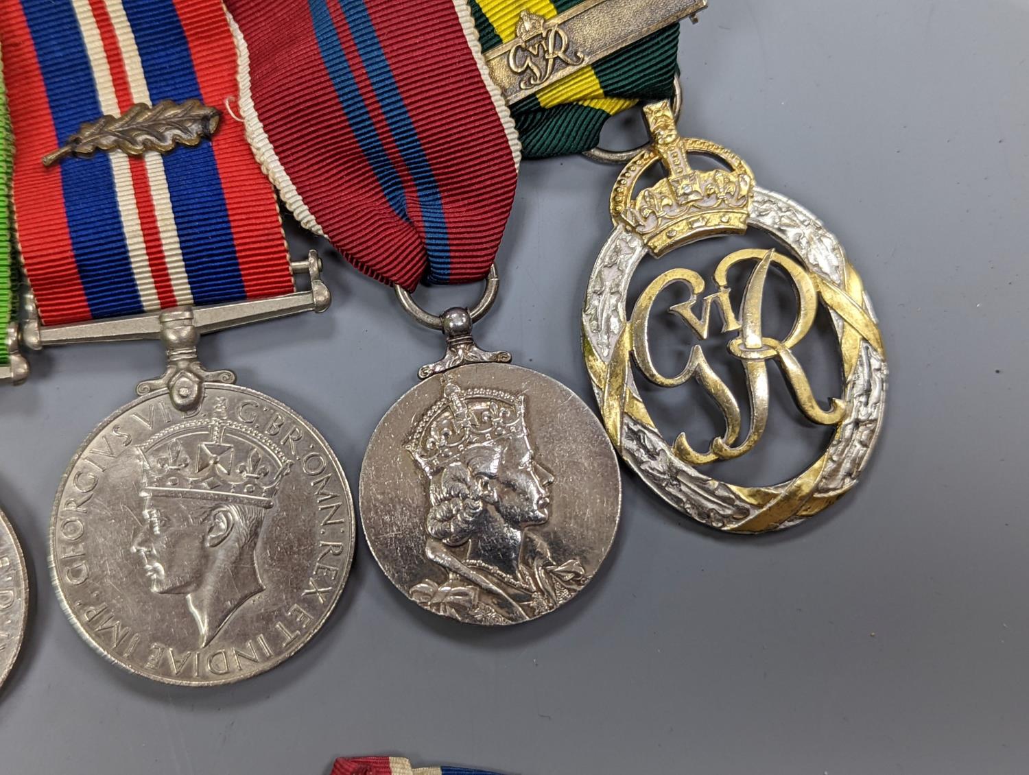 A WWII medal group of six, with miniatures, and a royal commemorative medal, 1937 - Image 4 of 15