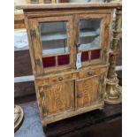 A 19th century Continental grained pine miniature dresser, width 39cm, depth 24cm, height 56cm