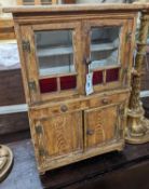 A 19th century Continental grained pine miniature dresser, width 39cm, depth 24cm, height 56cm