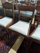 A set of six Regency mahogany dining chairs with rope twist backs
