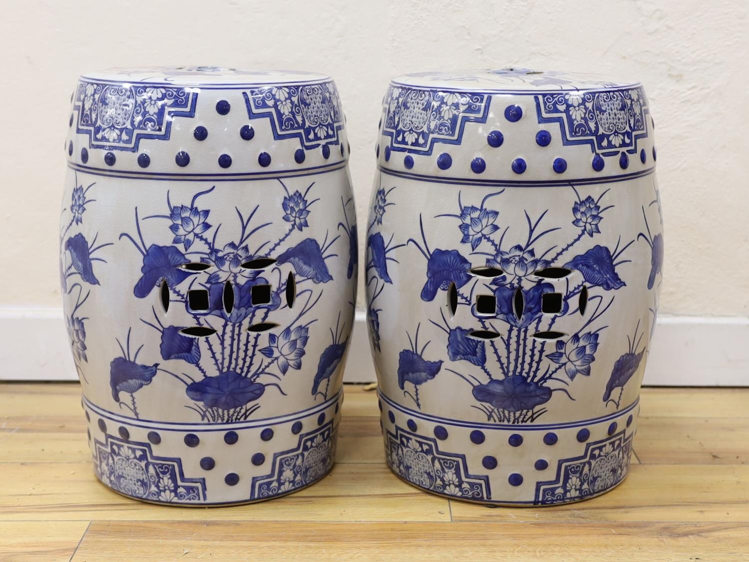 A pair of Chinese blue and white garden seats, 44 cms high. - Image 3 of 3