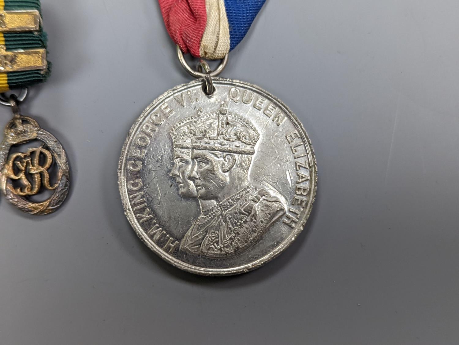 A WWII medal group of six, with miniatures, and a royal commemorative medal, 1937 - Image 5 of 15